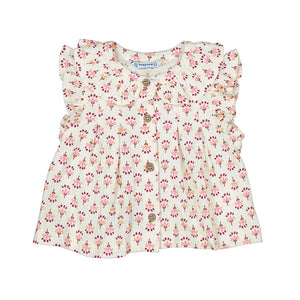 White shirt with pink flowers printed. Ruffle sleeves and buttons down the middle. 