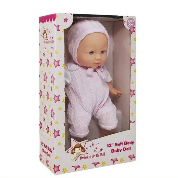 12-inch soft body baby doll in pink knit outfit and bonnet, displayed in a gift box with stars and labeled for ages 3 and up.