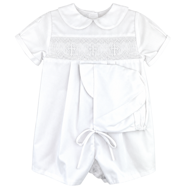 White baby boy romper with white cross smocking, Peter Pan collar, short sleeves and matching tie bonnet.