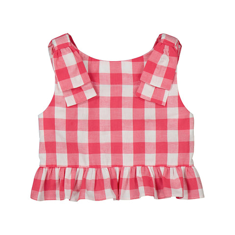 pink and white checkered top with ruffle at the bottom and bow tie sleeves. 