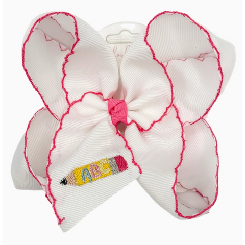 White grosgrain hair bow with hot pink stitched edges and embroidered yellow pencil featuring ABC lettering on the tail.