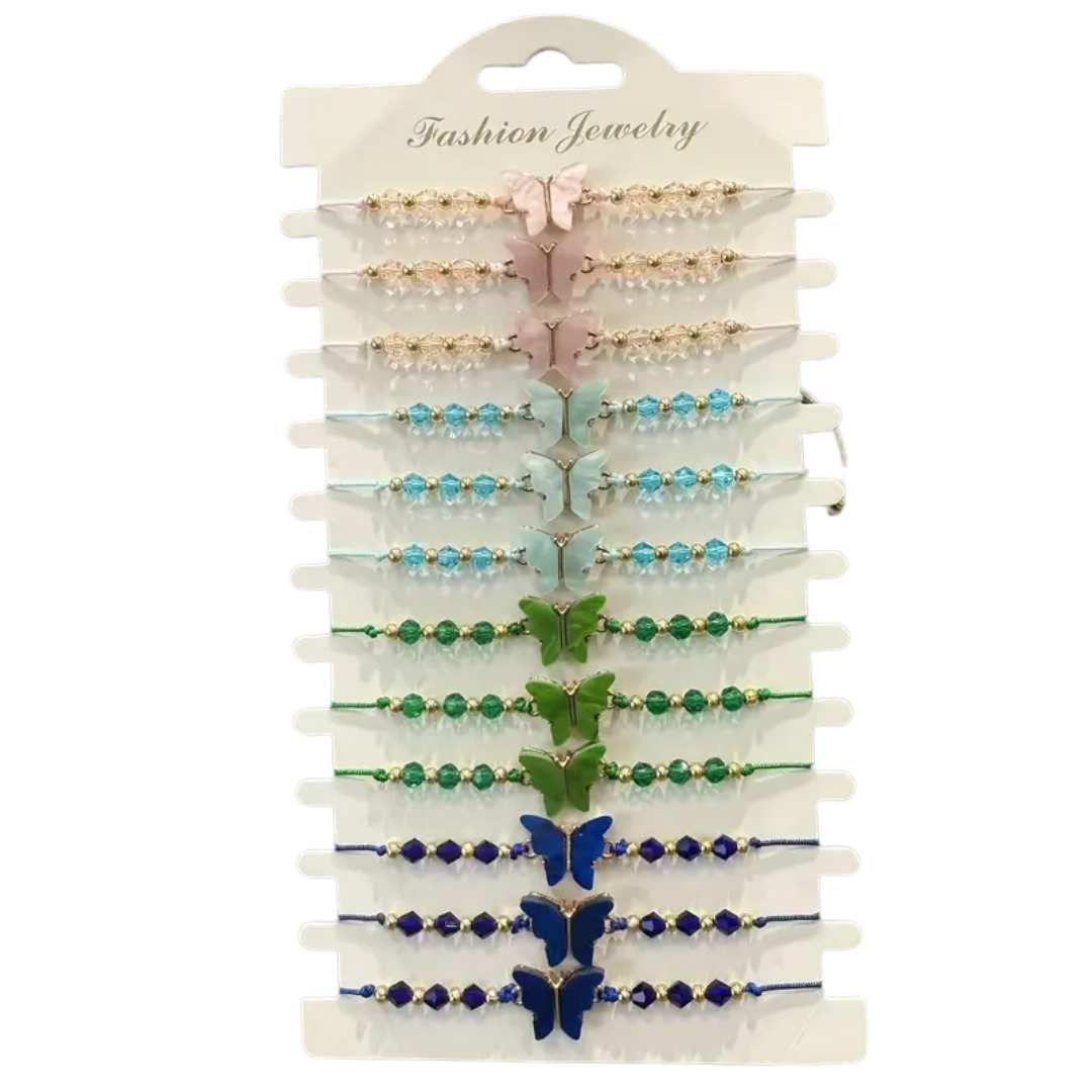 A product image showing a set of 12 adjustable butterfly bracelets displayed on a white cardboard hanger. The bracelets are arranged in pairs and feature various colored beads and a butterfly charm, with colors including pink, light blue, green, and dark blue.