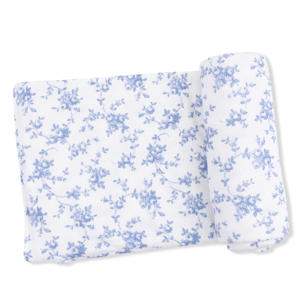 white and blue floral swaddling blanket