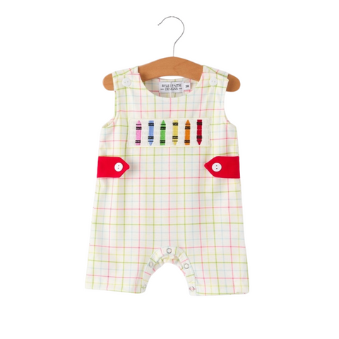 Front view of boys' pastel plaid romper with colorful crayon embroidery and red button-tab accents.