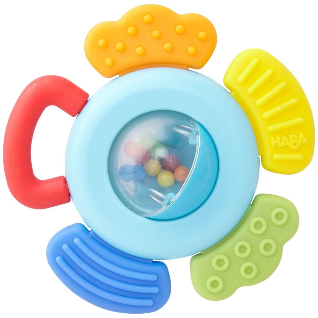 Colorful baby rattle with textured petals, a red handle, and a clear bead-filled center.