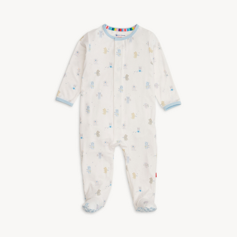 Baby wearing a soft TENCEL™ modal footie sleeper with magnetic closures and fold-over mittens for cozy, all-day comfort.