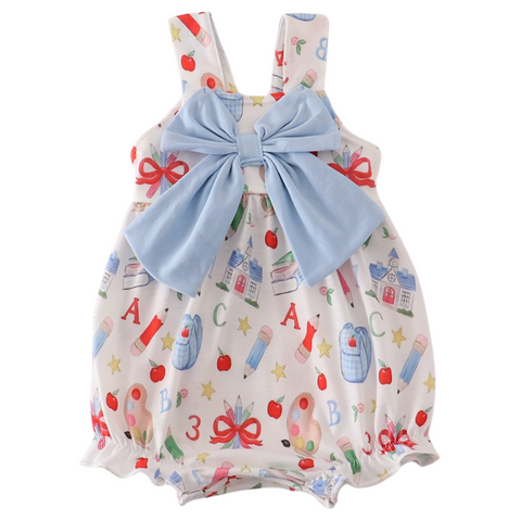 Baby girl bubble romper with pastel school-themed print and oversized light blue bow on front.