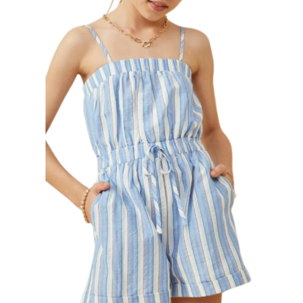 girl  wearing a blue and white striped romper on a white background