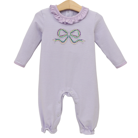 Lilac striped baby romper with long sleeves, ruffle neckline, and embroidered multicolor bow on a hanger against a white background.