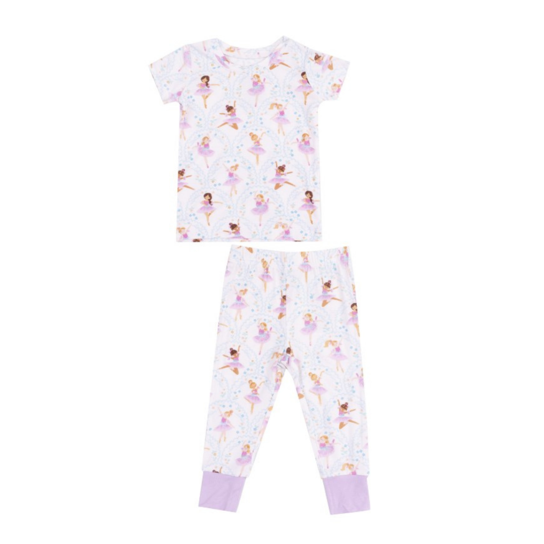 purple shirt and pants with a ballerina print. 