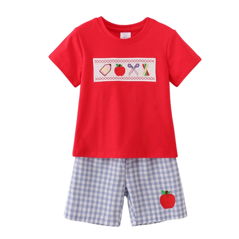 Front view of boys’ red tee with school-themed embroidery, paired with blue gingham shorts featuring an apple applique.
