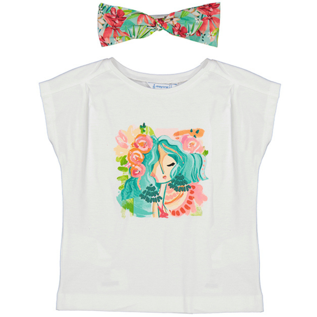 white t-shirt with a girl  with pink and orange floral on the front. has a matching teal and pink headband. 