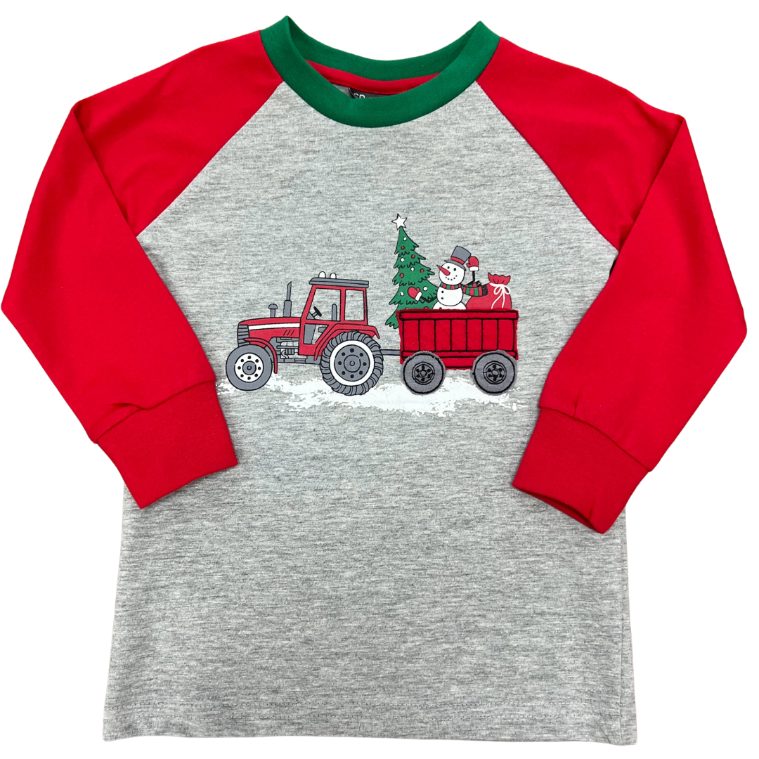 grey raglan tee with red sleeves and green neck trim.  Applique and embroidery of a tractor pulling a wagon with a snowman and  christmas tree and presents