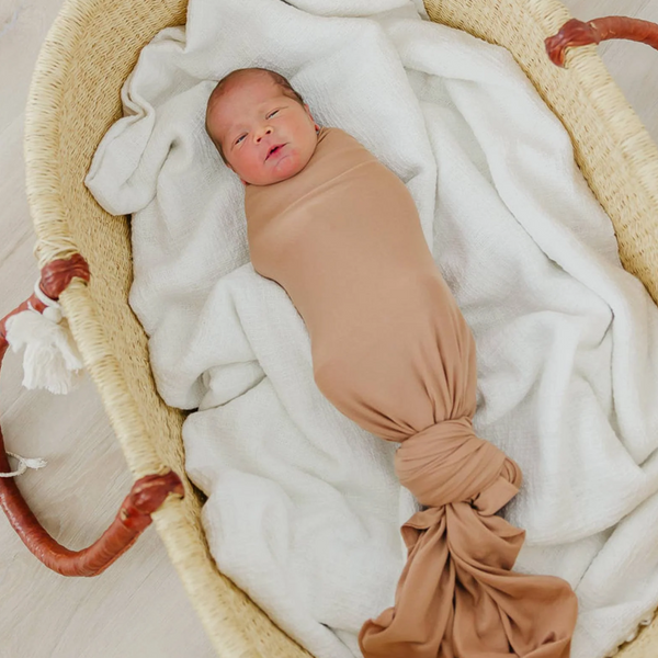 baby swaddled in copper pearl pecan swaddling blanket
