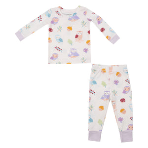 light purple two piece loungewear with owls, acorns, and mushrooms