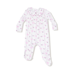 Front view of a long-sleeve baby footie with pink bow stripe print, smocked chest, and Peter Pan collar with pink trim