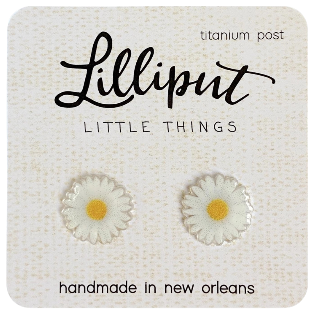 white daisies with a yellow center stud earrings