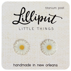 white daisies with a yellow center stud earrings