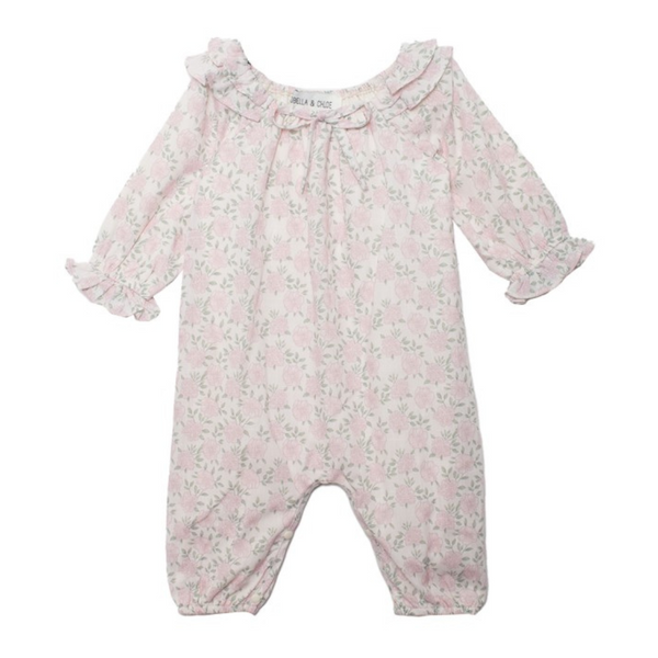 Front view of pink floral baby romper featuring ruffle collar, gathered neckline, and elasticized legs.