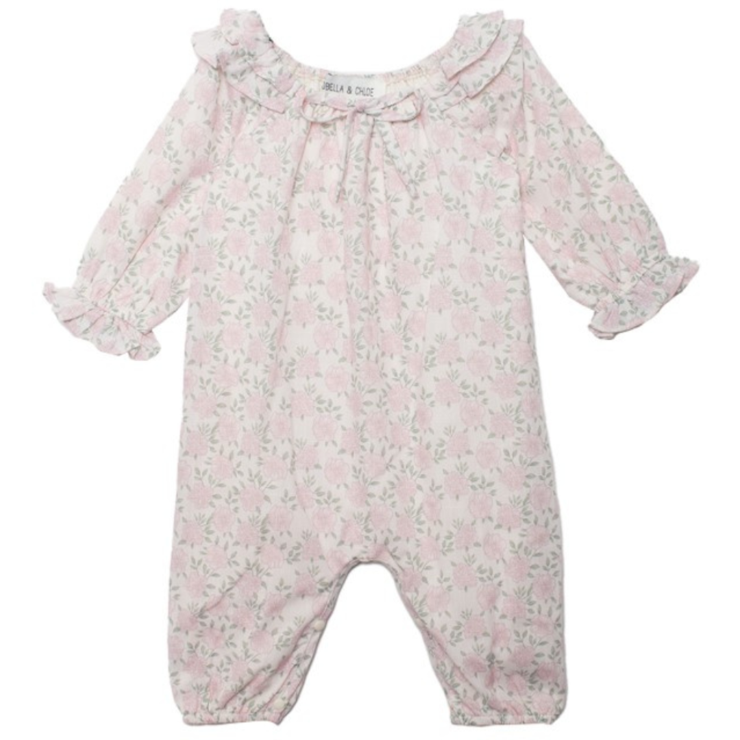 Front view of pink floral baby romper featuring ruffle collar, gathered neckline, and elasticized legs.