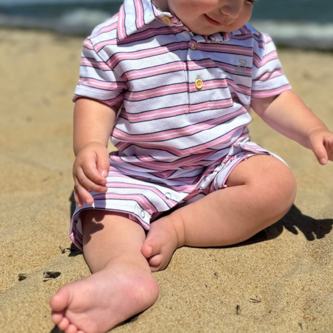 baby boy polo romper. three button front, collar and snap bottom.  Stripes of pink, white and navy