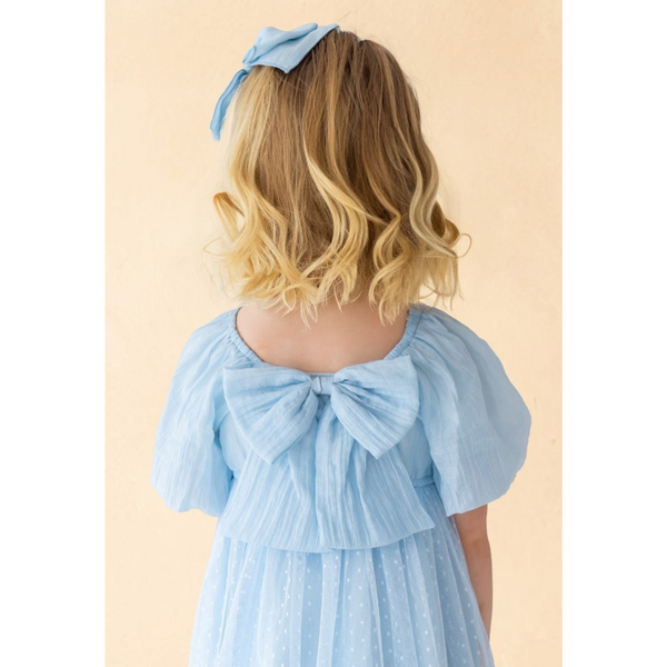 live photo of a little girl wearing the Ella Dress