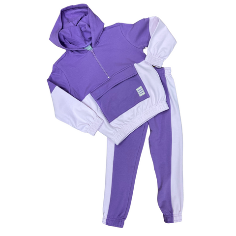 Sweatsuit style with a quarter zip jacket. Lavender with pink side inserts on the pants .