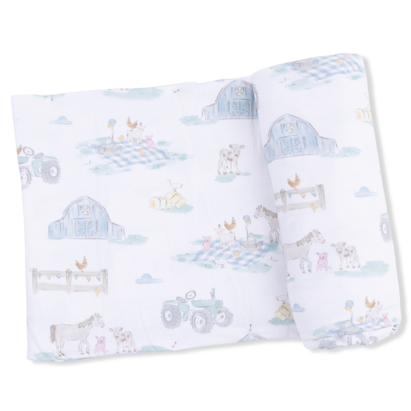 swaddling blanket with watercolor farm print in lighter pastel colors with animals having a picnic party