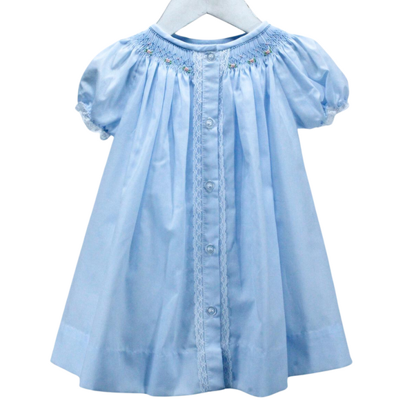 traditional style day dress for girl in baby blue. Lace touches at the button placket and sleeve with bullion roses smocked at the neckline