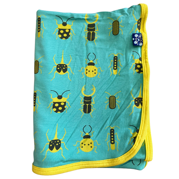 bamboo swaddling blanket in an aqua blue color with banana yellow and black beetle print. Trimmed in banana color