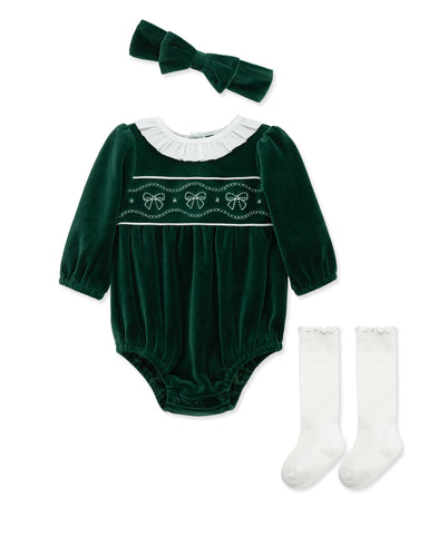 green bubble with bow stitching on the front with a matching headband and white knee high socks