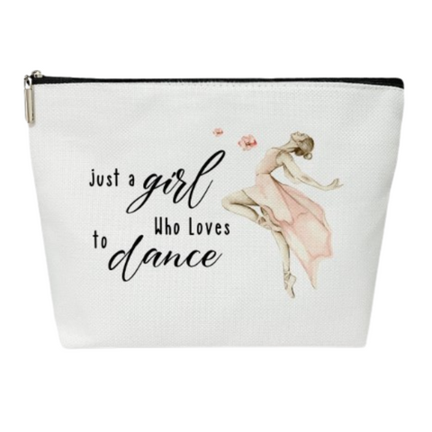 White zippered cosmetic bag with a ballerina illustration and the phrase "Just a girl who loves to dance."
