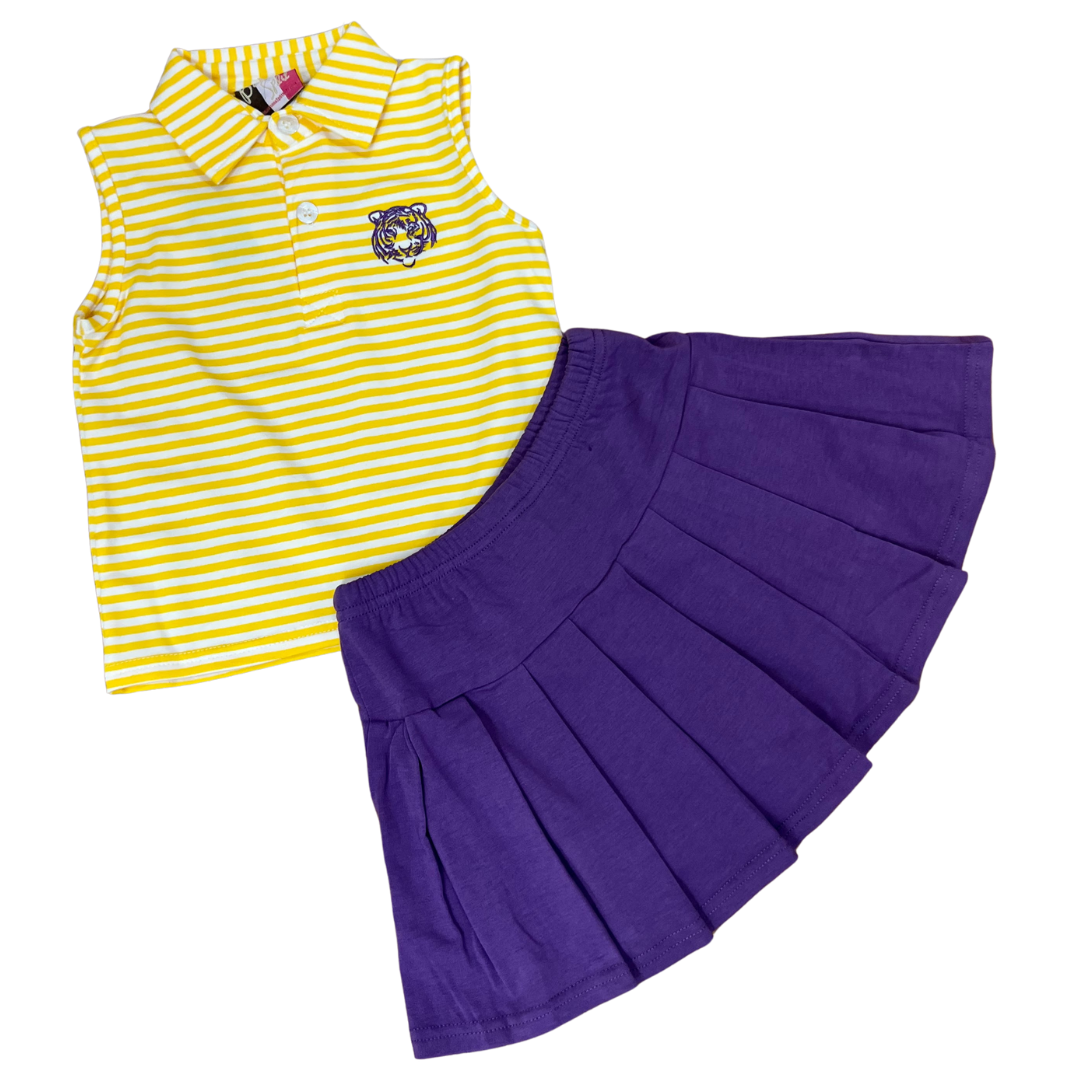 Yellow gold and white stripe sleeveless  collared top with an embroidered tiger face and  a purple  elastic waist pleated skirt