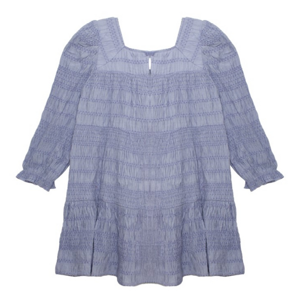 Back view of a blue smocked girls' dress with long puff sleeves and tiered skirt.