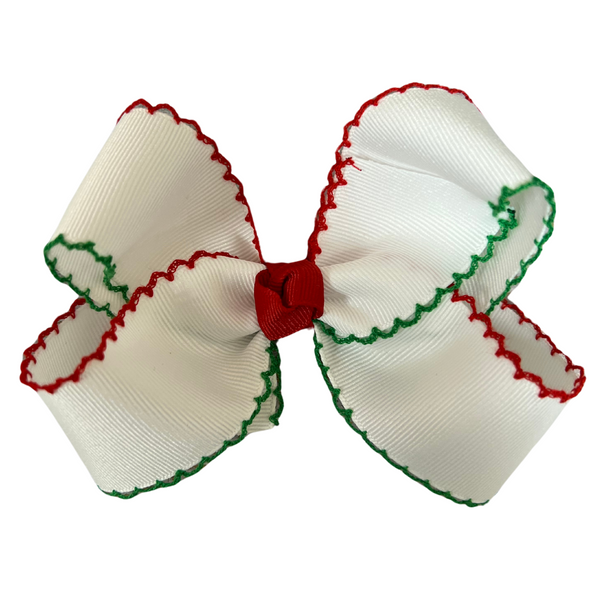 White bow with red and green moonstitch