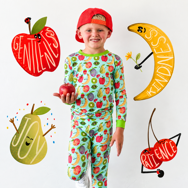 A little boy modeling fruits of the spirit lounge set.