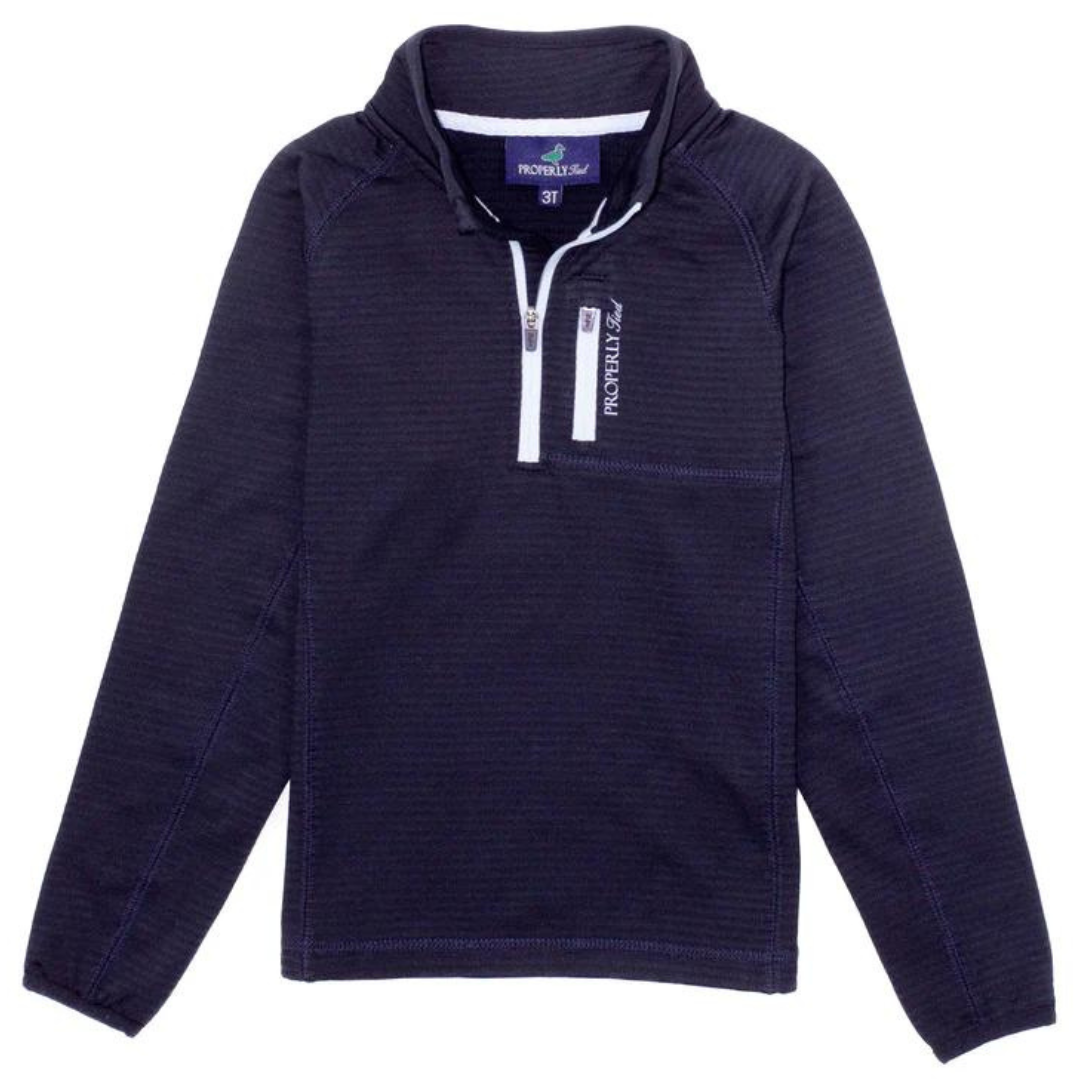 Navy blue quarter zip pullover jacket accented with a white front zipper and the properly tied logo