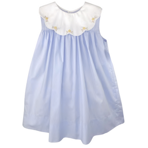 blue dress with large white scalloped collar with yellow flowers on it. 