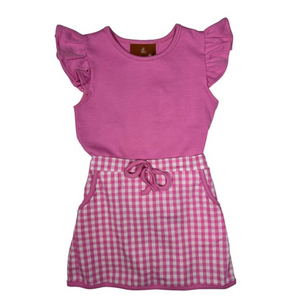 pink shirt with ruffle sleeves and a matching pink gingham skort. has pockets and a faux tie. 