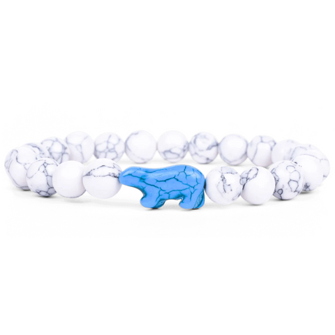 Fahlo polar bear tracking bracelet with Arctic-themed packaging, featuring conservation info and GPS tracking access to follow a real bear's journey.
