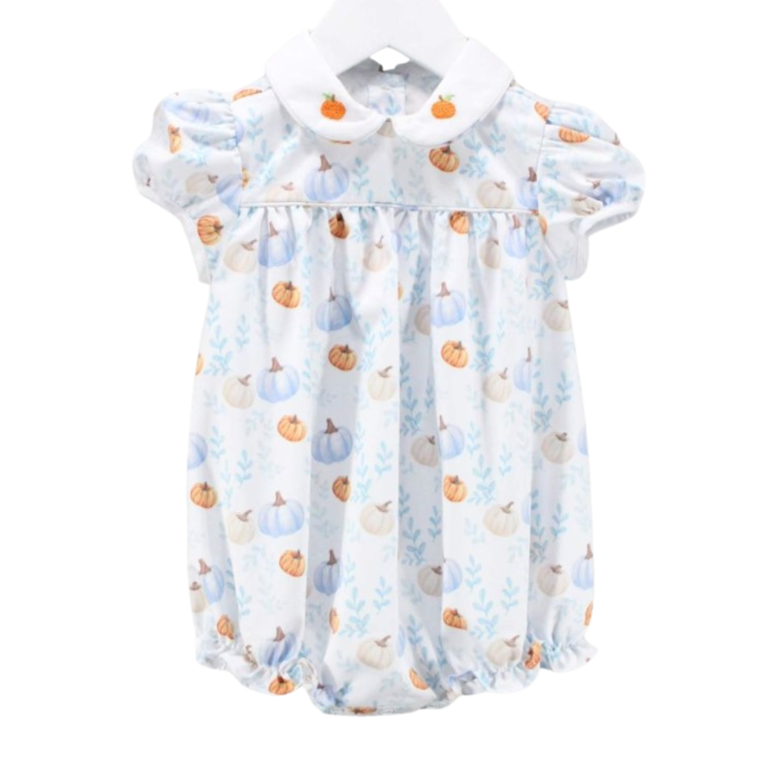 Front view of a baby girl's bubble romper with a fall pumpkin print and white Peter Pan collar embroidered with pumpkins.