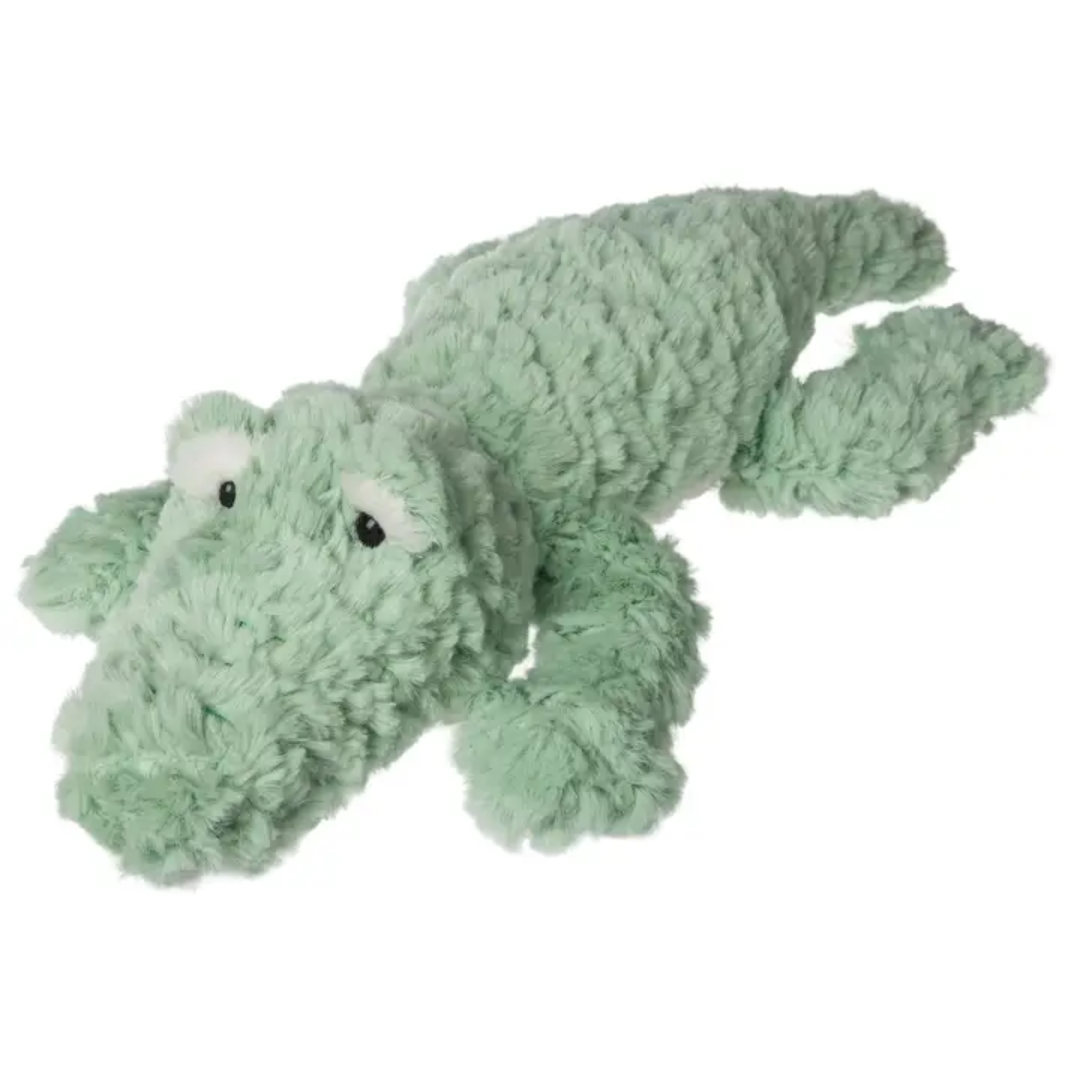 Assorted Putty plush toys in soft, warm colors with cozy fabric and gentle smiling faces