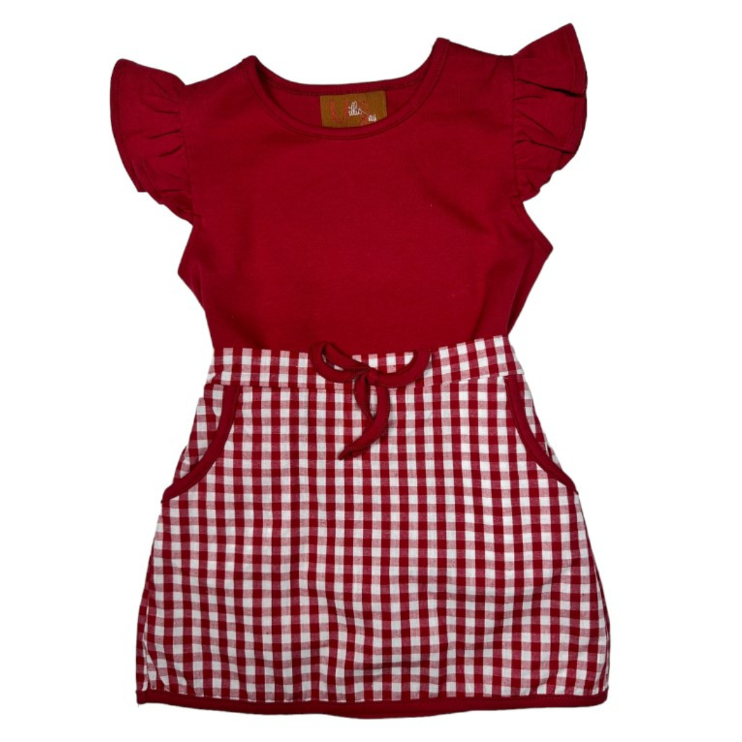 red shirt with ruffle sleeves and a matching red gingham skort with pockets and a faux bow tie.