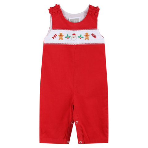 Front view of red velvet Christmas overalls for babies featuring festive smocking and bottom leg snap closures.