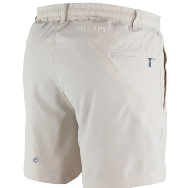 Boys stone khaki shorts with elastic waistband, side pockets, and back zipper pocket shown on white background.