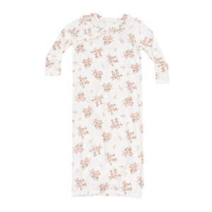 white gown with rose floral print. 