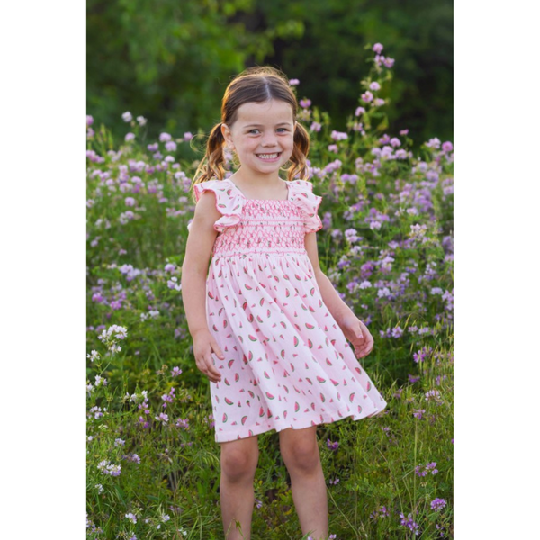 live photo of a little girl wearing the watermelon sugar dress
