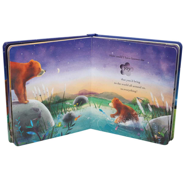 Open book with illustrations of a bear and text on a white background