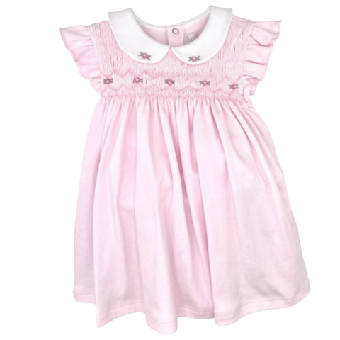 pink dress with full rose smocking and a rounded white collar with two roses on it. 
