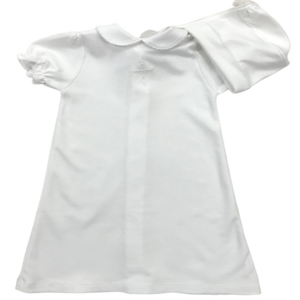 white daygown with knitted cross on the front and a rounded collar. has a matching bonnet. 